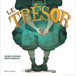 Couverture du livre 'Le Trésor' avec un personnage aux vêtements verts tenant une boule, titres en lettres dorées.