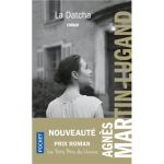 Couverture du livre 'La Datcha' d'Agnès Martin-Lugand, présentant une femme regardant en arrière dans un environnement extérieur.