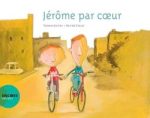 Couverture du livre 'Jérôme par cœur', montrant deux enfants à vélo sur une rue avec des bâtiments en arrière-plan.