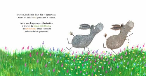 Deux ânes courant joyeusement sur un chemin, entourés de fleurs colorées dans une prairie verdoyante.
