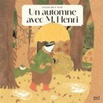 Couverture d'un livre intitulé 'Un automne avec M. Henri', illustrée avec un personnage animal dans une forêt automnale.
