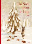 Couverture d'un livre intitulé 'Un Noël pour le loup', illustrée avec un loup debout près d'un sapin enneigé.