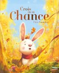 Couverture du livre 'Crois en ta Chance' avec un lapin dans une forêt illuminée par des feuilles d'automne.