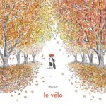 Deux enfants avec un vélo sous des arbres aux feuilles d'automne colorées, avec le titre 'le vélo' en bas.